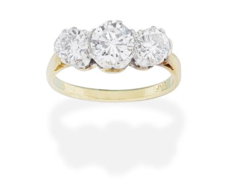 DIAMOND THREE-STONE RING,  1972Set with three brilliant-cut diamonds, mounted in 18 carat gold, diamonds approx. 1.60cts tota