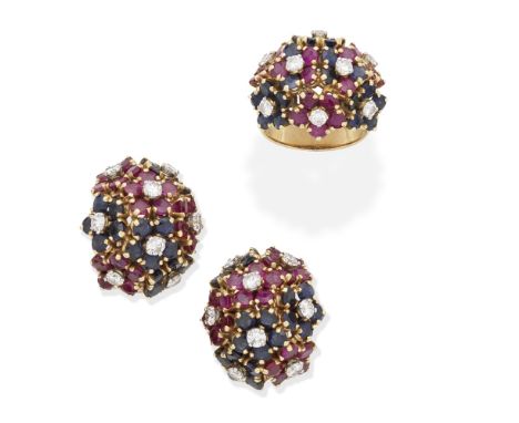 RUBY, SAPPHIRE AND DIAMOND RING AND EARCLIP SUITE, CIRCA 1960The bombé ring set with clusters of circular-cut ruby and sapphi