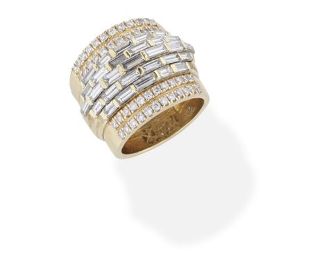 DIAMOND-SET DRESS RINGThe wide band set to the centre set with tiered rows of baguette-cut diamonds between two rows of brill