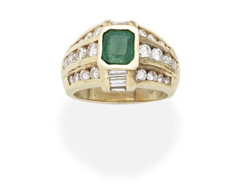 EMERALD AND DIAMOND RINGOf bombé design, the octagonal-cut emerald, between baguette-cut diamonds, the shoulders set with bri