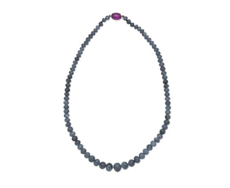 SAPPHIRE BEAD NECKLACE WITH RUBY CLASPThe graduated sapphire beads on a cabochon ruby clasp, length 42.0cmFootnotes:Accompani