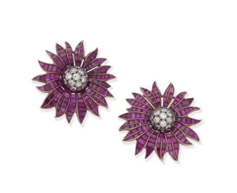 RUBY AND DIAMOND EARRINGS, MID 20TH CENTURYEach of flowerhead design, the centre set with brilliant-cut diamonds, with calibr