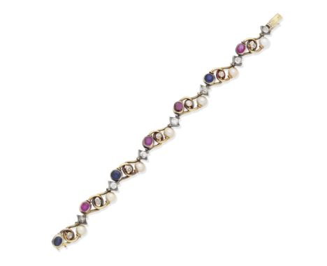 RUBY, SAPPHIRE, DIAMOND AND PEARL BRACELET, CIRCA 1930Designed as undulating interlocking links set with 6.0mm pearls, cushio