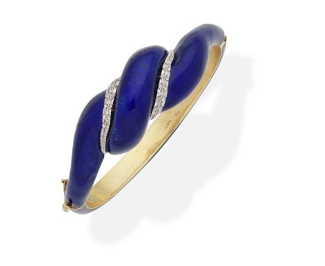 ENAMEL AND DIAMOND-SET BANGLE, 19TH CENTURYThe hinged bangle of twisted design, decorated throughout with blue enamel, and ac