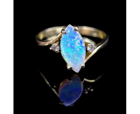 Opal set in a gold plate ring approx marquise cut opal size 11.81mm x 6.41mm x 1.18mm, ring size P