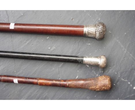 Two various vintage silver topped walking canes each silver top as inspected, (breaks &amp; dents), (length 90cm approx, each