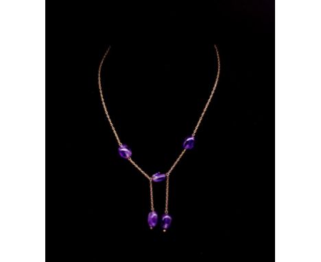 9ct rose gold and amethyst lavaliere marked 9ct to spring ring. Approx necklace length 42cm