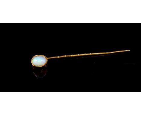 Solid white opal and gold stick pin unmarked stick pin. Opal cabochon showing some greens, blues and orange. Approx weight 1 