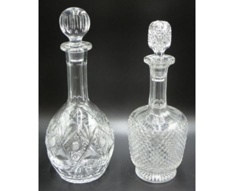 Edwardian diamond cut crystal decanter c.1910, 30cm high approx., and a faceted neck cut crystal decanter
