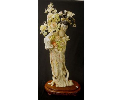 Very Large vintage carved ivory figure of a lady holding flowers, 53cm high. NB this item may not be exported.