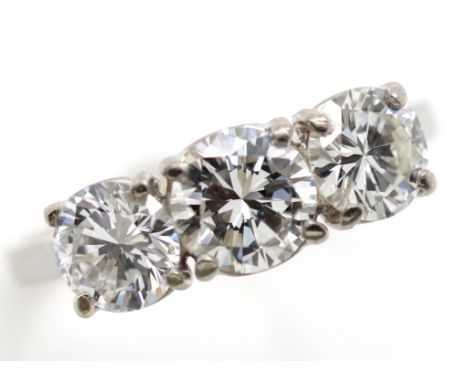 Three stone diamond set 18ct white gold ring approx 0.76ct centre diamond and 2x 0.58ct accompanying diamonds F colour, VS1 c