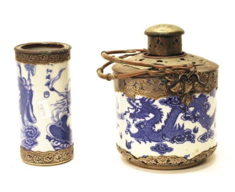 Chinese blue and white ceramic tea caddy with metal fixtures together with a Chinese blue and white vase with metal rims.