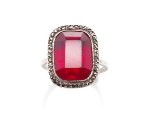 Silver and red stone ring marked Sterling Germany. Approx ring size K