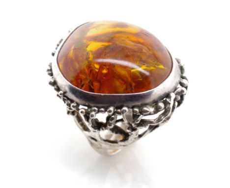 Antique amber set silver ring made in Konigsberg. Provenance Sac Freres Bond Street 1976. Invoice original states Circa 1840.