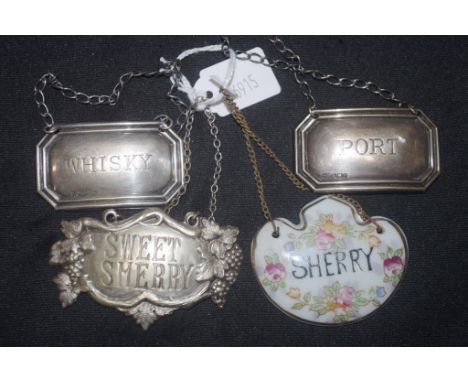 Two sterling silver decanter labels marked Birmingham 1988 Port and Whiskey, together with plated sweet sherry and ceramic sh