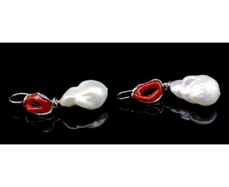 Baroque pearl and coral earrings set on silver kidney ear wires.