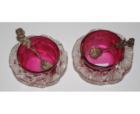 Pair of Victorian ruby glass salt cellars together with 2 silver rose salt spoons, stamped 925