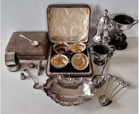 A George III silver Hanoverian serving spoon by Thomas Dene, London, 1770, 20.5 cm; a cased set of four George V silver embos