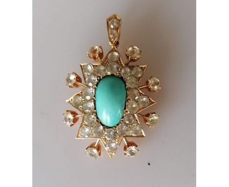 A Victorian Indian-style diamond and turquoise pendant on a yellow gold frame, the central turquoise approximately 14mm x 8mm