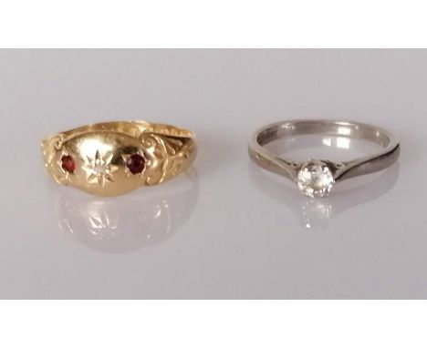 An early 20th century ruby and diamond ring and a white gold diamond solitaire, the round cut diamond approximately 0.20 cara