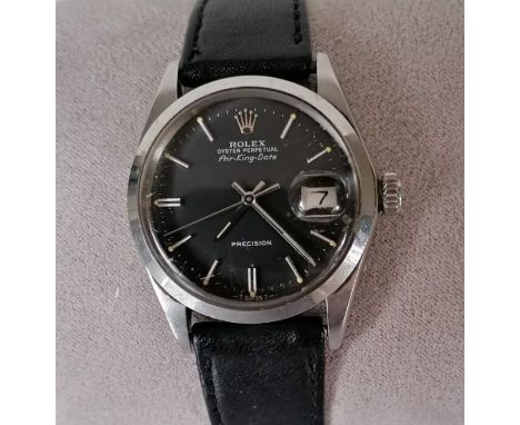 A Rolex Oyster Perpetual Air-King-Date Precision stainless steel-cased wristwatch, 34mm, with black dial, model 5700, automat