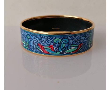 A Hermes gold tone and enamel bangle, internal diameter 60mm, with logo and Made In Austria to inside and original box (box n