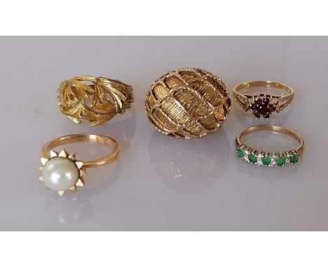 Two vintage yellow gold dress rings, one with pearl decoration, the other with foliage design, both unmarked, tests for 18ct,