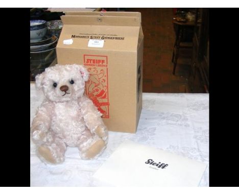 A collectable Steiff Teddy Bear 'Jakob' with squeaker - smoky white with Certificate - 26cm long - boxed 