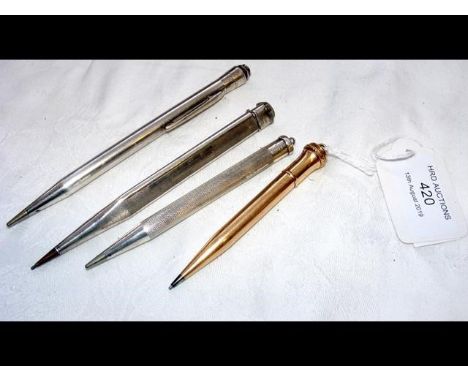 Three silver and one rolled gold propelling pencils 
