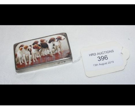 A silver and enamel vesta case - the 6cm x 3cm top depicting a pack of hounds - having hallmark to side CONDITION REPORTWear 