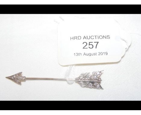 An art deco style platinum and gold diamond 'arrow' brooch, in presentation case - 6cm long CONDITION REPORTGood condition; d