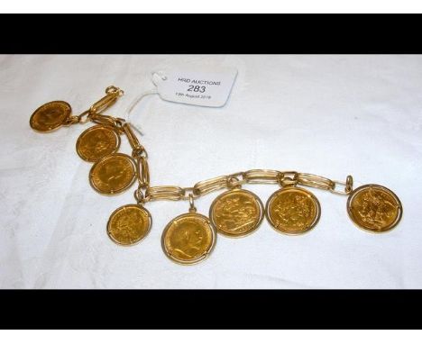 A 750 marked lady's bracelet with six full sovereign mounts, a 1935 20 franc gold coin and an 1892 10 franc gold coin (83g to