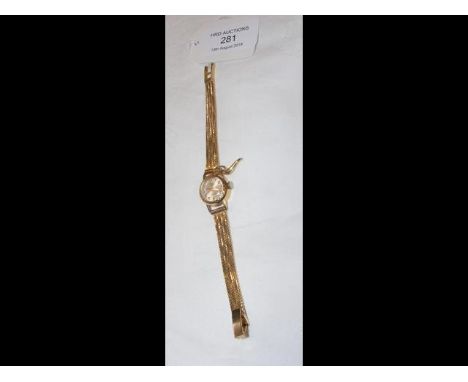 A lady's elegant 18ct gold wrist watch by Ticin CONDITION REPORTStrap is 18k - approx total weight 21.6g - ticking order - br