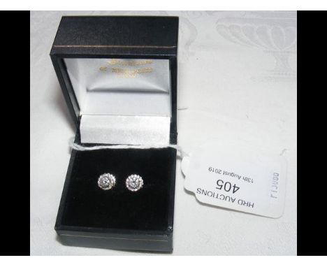 A pair of 18ct white gold diamond stud earrings - 1.2ct total 