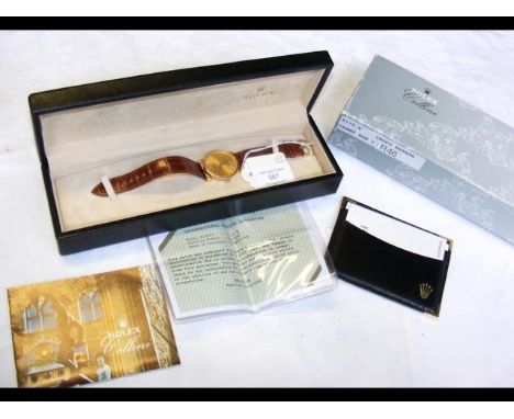 A gent's Rolex Cellini 18ct gold wrist watch with crocodile strap and papers for 2005 - with original box CONDITION REPORTver