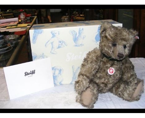 A collectable Steiff Teddy Bear 'Jeremy' with growler - silver with Certificate - 40cm long - boxed 