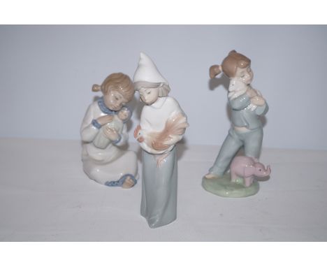 Lladro figure of a young girl together with 2 Nao figures Largest 20 cm