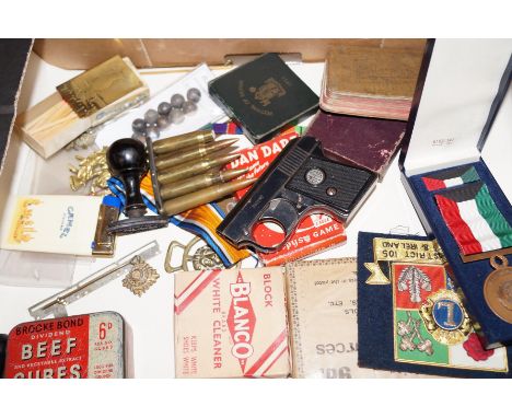Group of vintage items to include cap gun &amp; liberation medal 