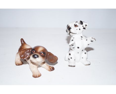 Goebel figure of a dog together with a dalmatian figure Largest 10 cm