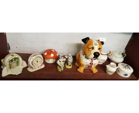 SHELF OF CHINAWARE INCL; BRITISH BULL DOG COOKIE JAR ETC & CLOCKS