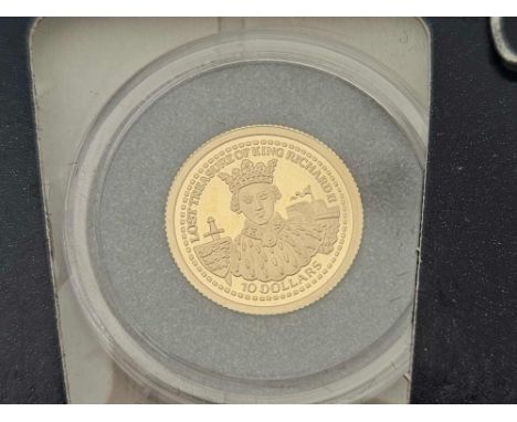 A GOLD (99%) MINIATURE PROOF MODEL