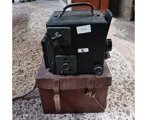 AN EASTMAN KODAK PLATE CAMERA WITH LEATHER CARRY CASE