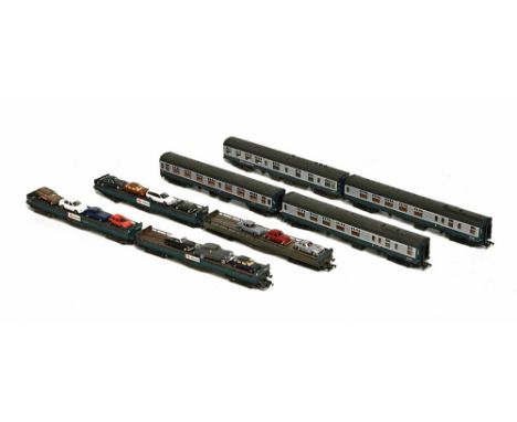 Four Hornby car transporters and cars, two Bachmann coaches a mainline and Hornby coach