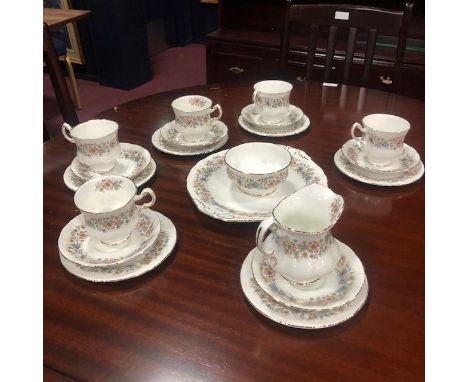 PARAGON PART TEA SERVICE, with floral and gilt decoration, comprising 5 cups, 6 saucers, 6 side plates, sugar, cream and cake