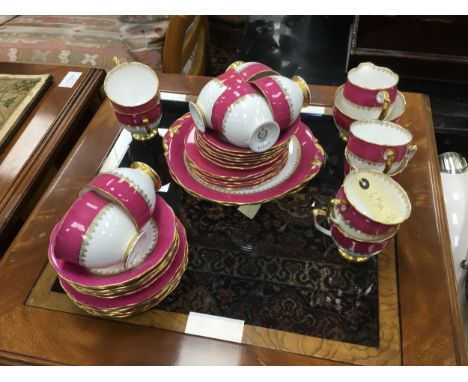 QUEEN ANNE CHINA PART TEA SERVICE, with pink decoration, comprising 11 trios, additional cup and saucer, cream, sugar and two
