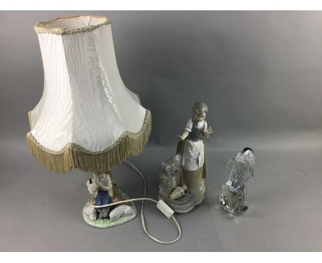 NAO FIGURE OF A GIRL BY A WATER FOUNTAIN, 30cm high, along with a Nao figural table lamp, modelled with a boy and sheep, with