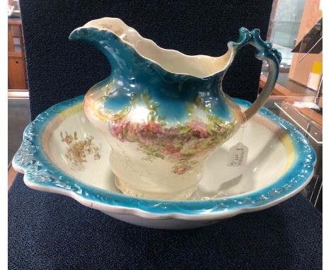20TH CENTURY BASIN, EWER, CHAMBER POT AND JUG, with floral decoration, the basin 42cm diameter