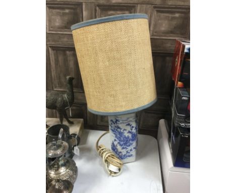 20TH CENTURY BLUE AND WHITE VASE LAMP, with shade, along with a an Indian inspired candlestand with figures and elephants in 