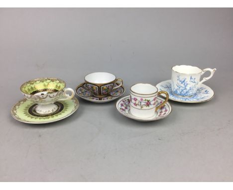 FOUR VINTAGE COFFEE CUPS AND SAUCERS, including Limoges, Coalport and a Vienna style example, along with a Lladro figure of a