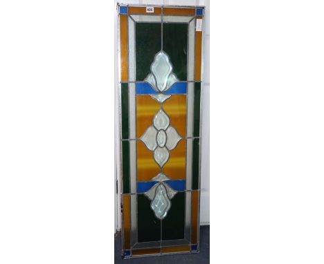 A stained glass panel, 38 x 106cm